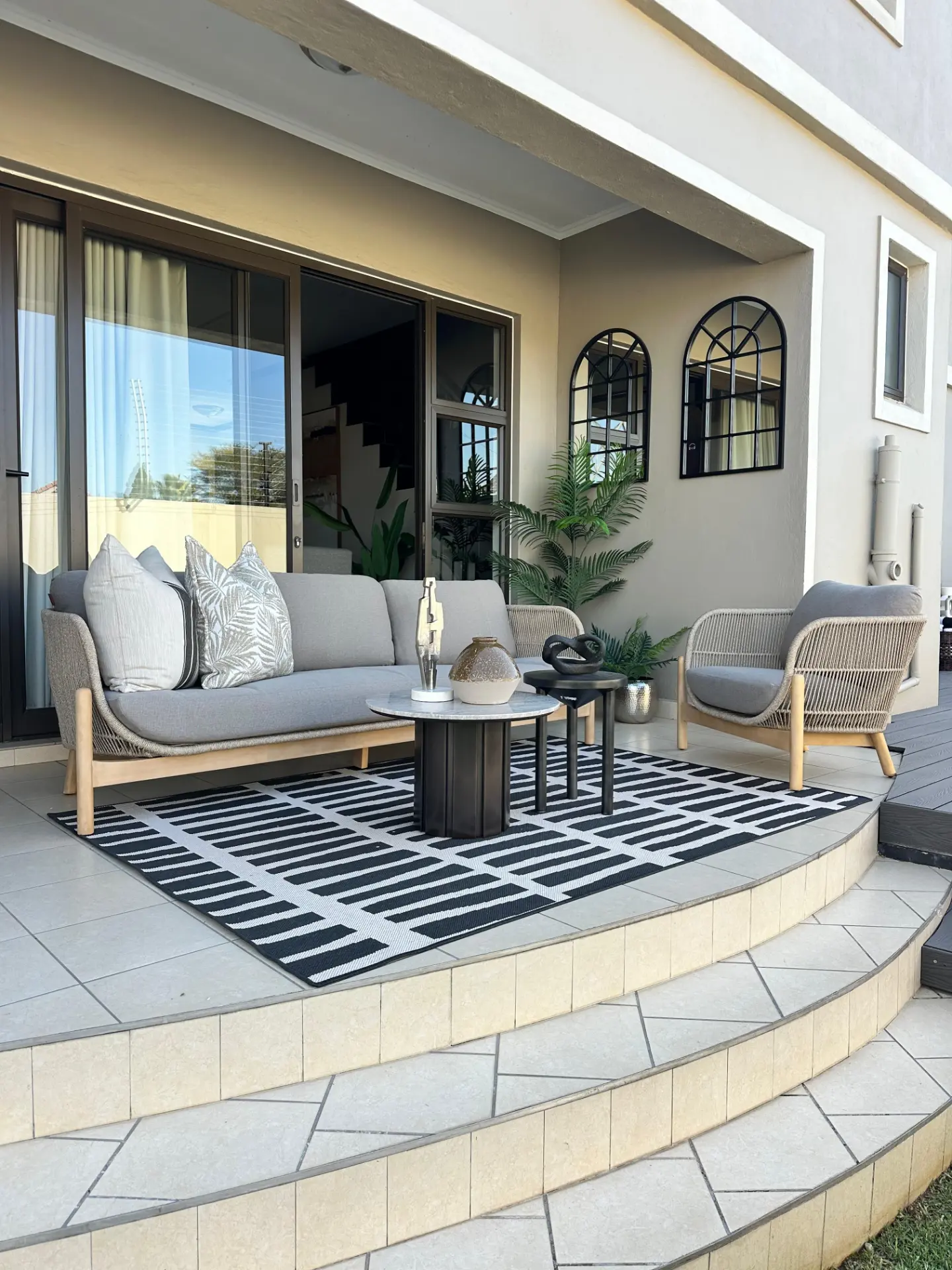 Covered patio lounge with outdoor seating at 34 Mont Trenblant